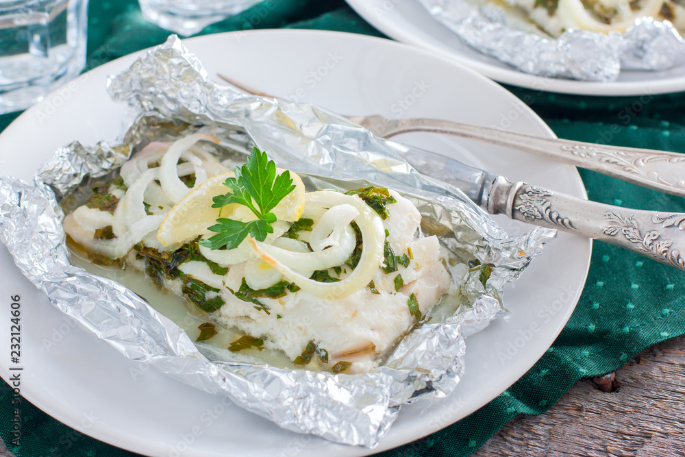 Cod baked in foil with parsley and onion, horizontal