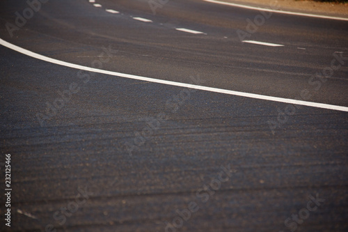 Obraz na płótnie Asphalt road with marking lines white stripes w salonie