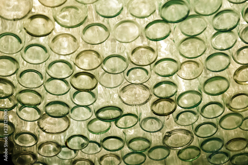 Many colored wine bottles, bottom view. Concept designer ceiling in restaurant, bar, creative interior photo