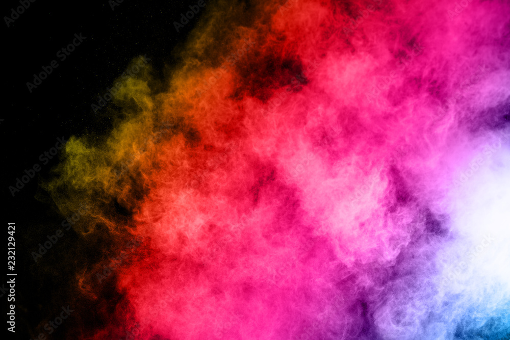 Fototapeta premium abstract colored dust explosion on a black background.abstract powder splatted background,Freeze motion of color powder exploding/throwing color powder, multicolored glitter texture.