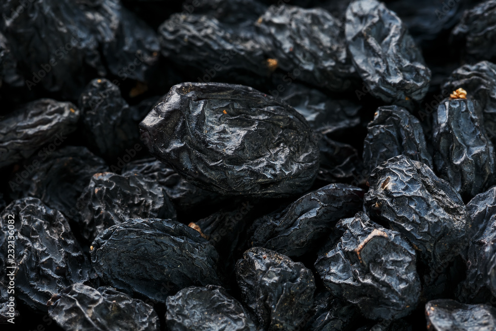 Black Raisin texture, popular dried fruit. Dried grapes. Black Raisin texture, popular dried fruit. Dried grapes.