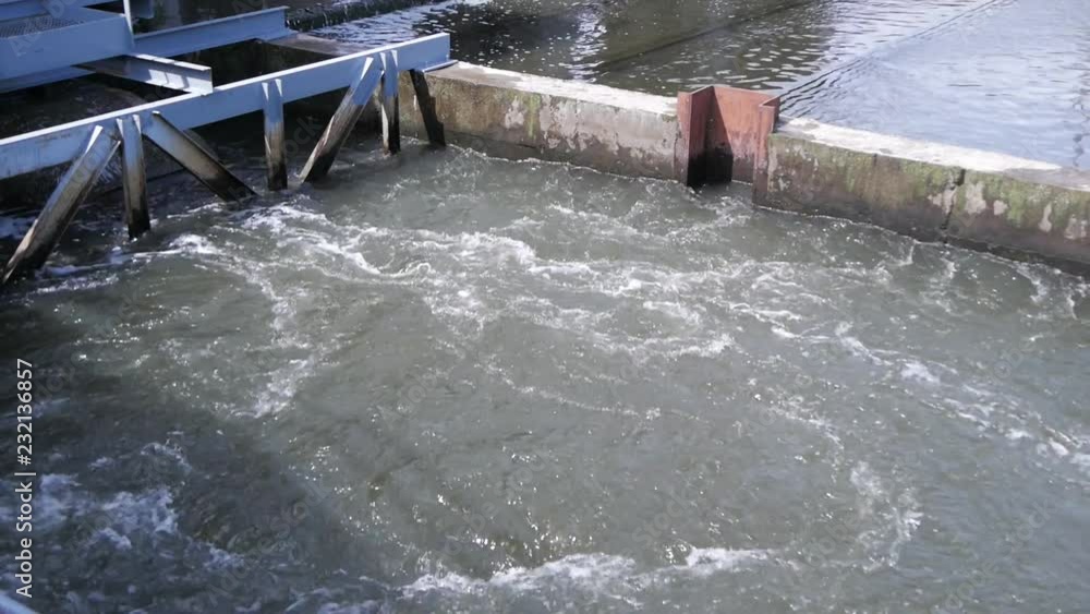 custom made wallpaper toronto digitalThe turbulent water of the dam. Flowing water at small dam.