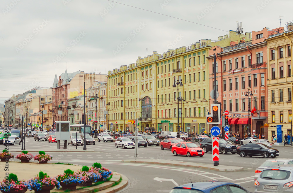 Naklejka premium Saint Petersburg, RUSSIA - July 08, 2018: A lot of cars going on the main street of St. Petersburg. The city was founded in 1703, is now the second largest city in Russia.