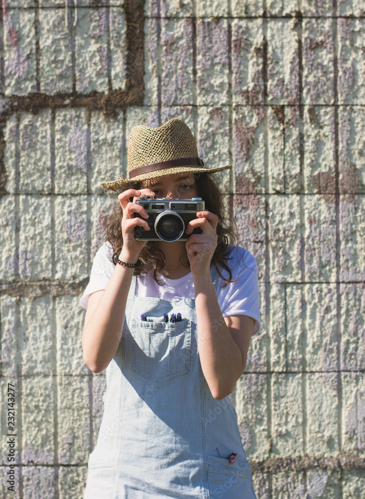 Stylish woman with retro photo camera Stylish woman with retro photo camera