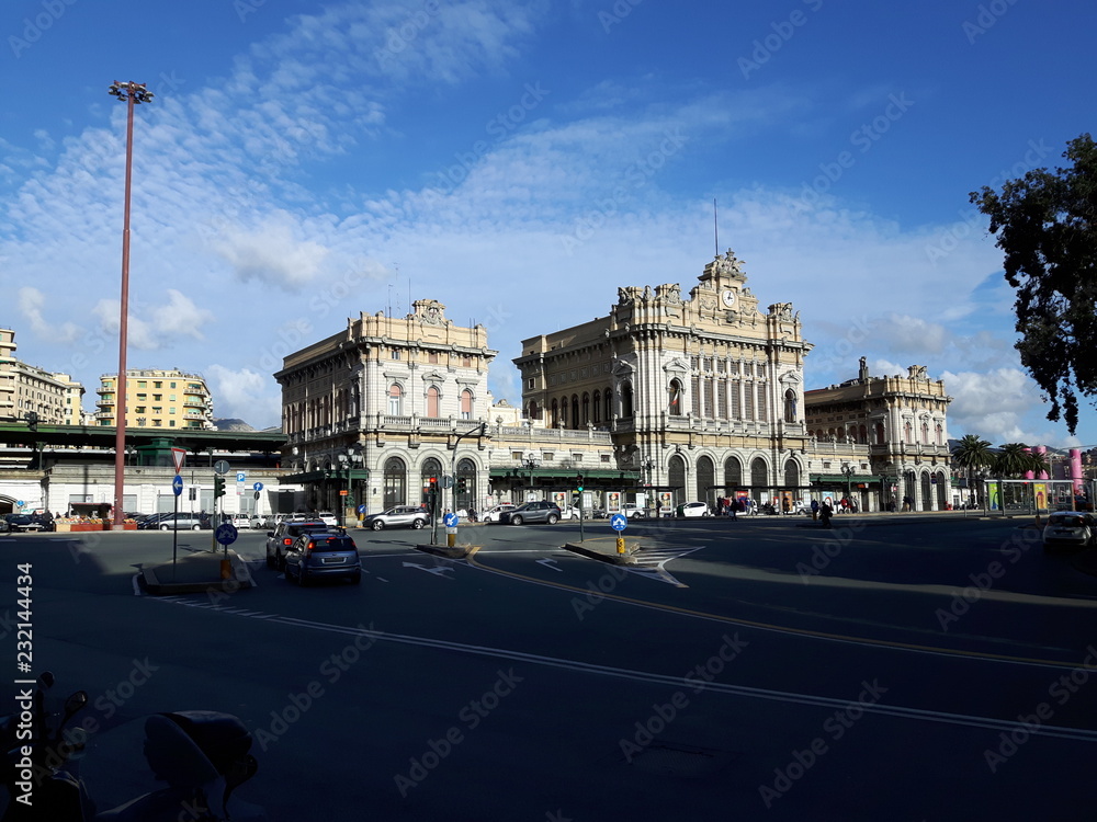  An amazing views of the pld station of Genoa in autumn with a great blue sky and some old parts of the city