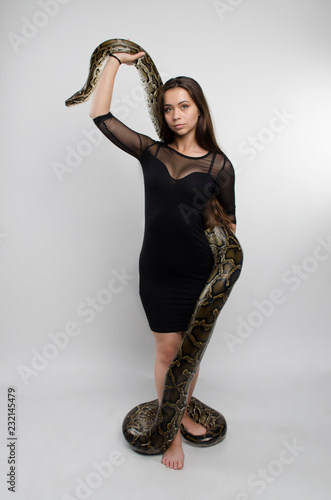 sensual woman and python