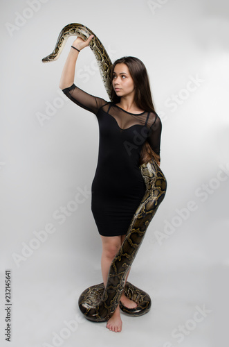 sensual woman and python