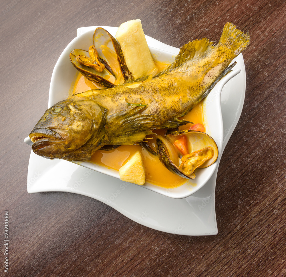 Peruvian Food Rockfish soup, called "sudado de trambollo" Stock Photo