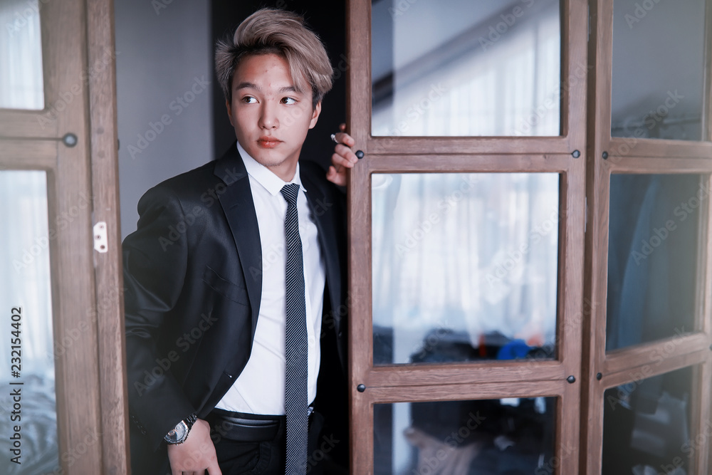Young Asian businessman in white shirt and tie Young Asian businessman in white shirt and tie