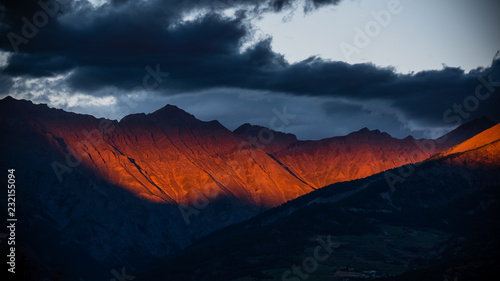 Fototapeta Naklejka Na Ścianę i Meble -  Maritime Alps in South of France illuminated by dramatic sunset light and skies