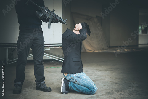 Businessman is hostage from bandit,Thailand people,Hostage of terrorist man concept