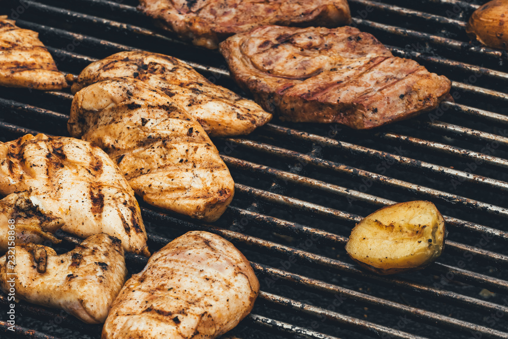 Grilled steak. Аood. Fried meat on grill. Golden roasting Grilled steak. Аood. Fried meat on grill. Golden roasting