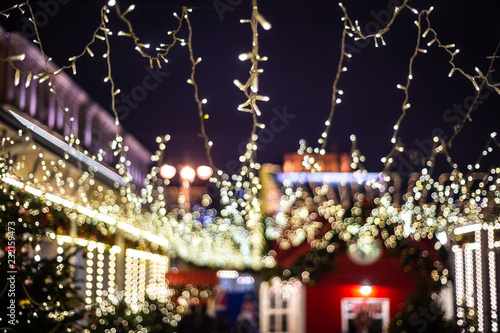 Christmas illumination  market shop  festively decorated. background blur