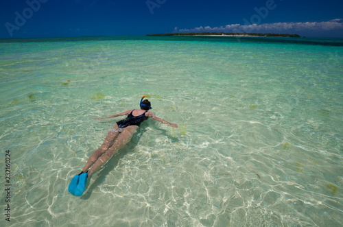 Zanzibar, woman, black swimsuit, snorkeling