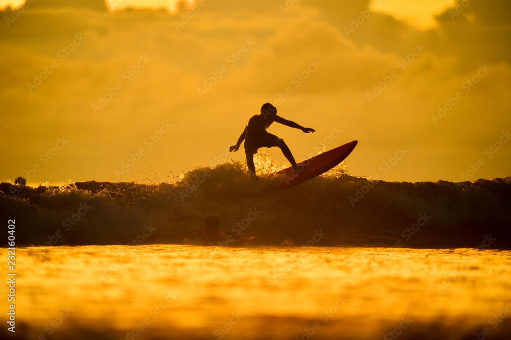 silhouette of surfboard player in the sunset (actual short) silhouette of surfboard player in the sunset (actual short)