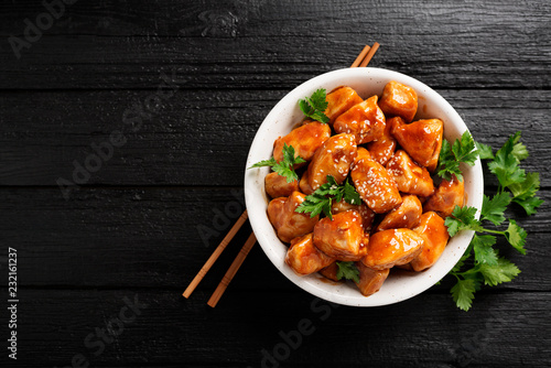 Spicy sweet and sour general tso chicken .