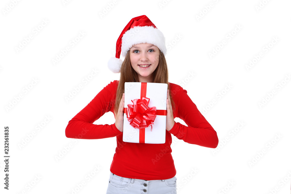 Young girl in santa hat holding gift box on white background Young girl in santa hat holding gift box on white background