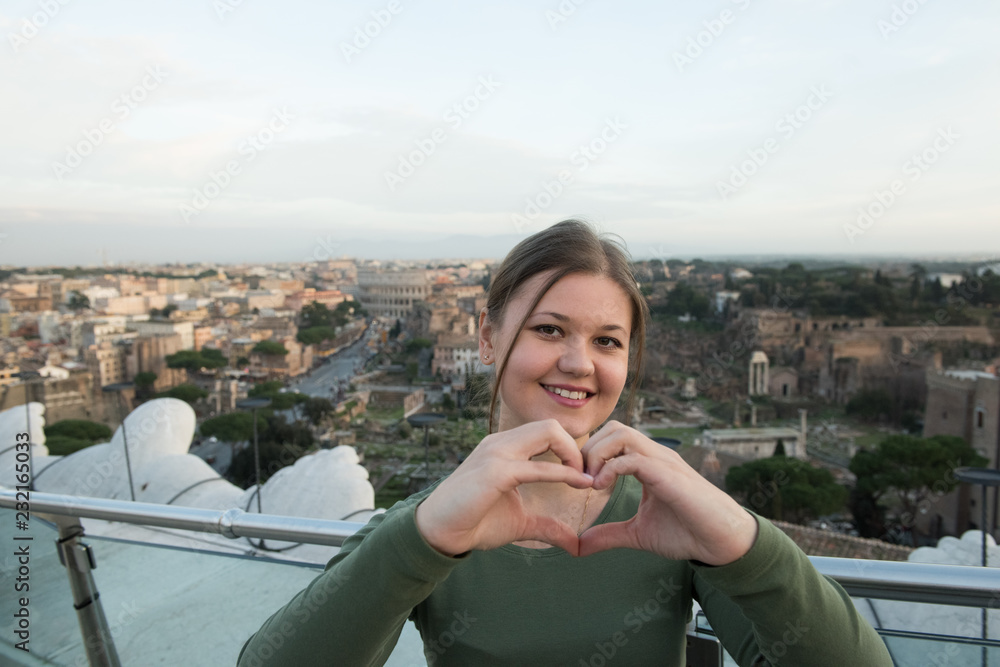 Fototapeta premium Woman on roof in Rome