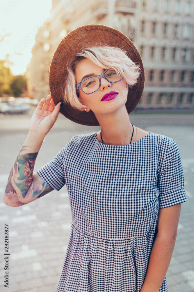 Vertical portrait of pretty blonde girl 