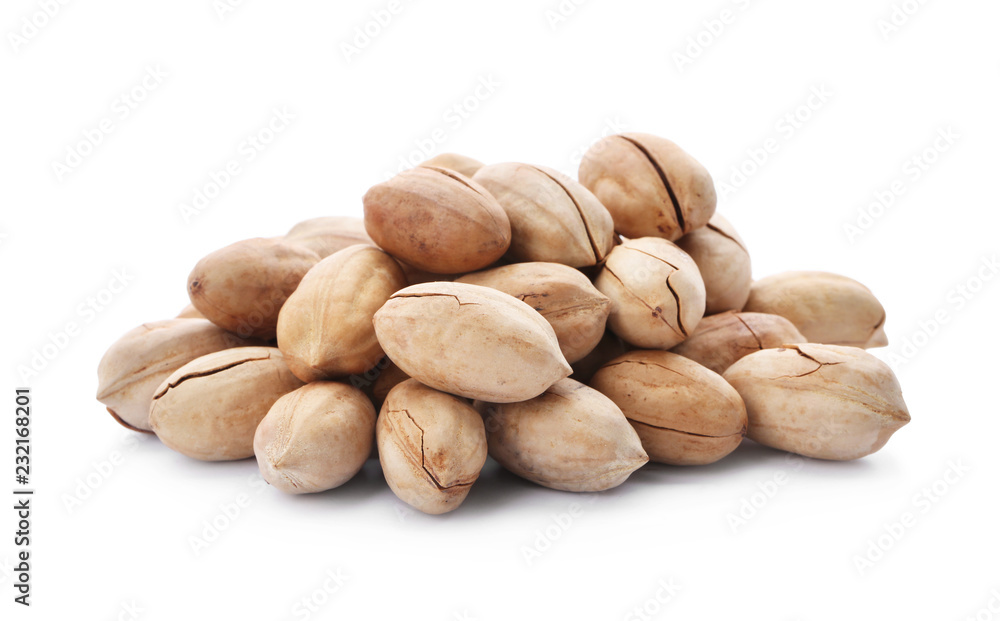 Heap of pecan nuts in shell on white background Heap of pecan nuts in shell on white background