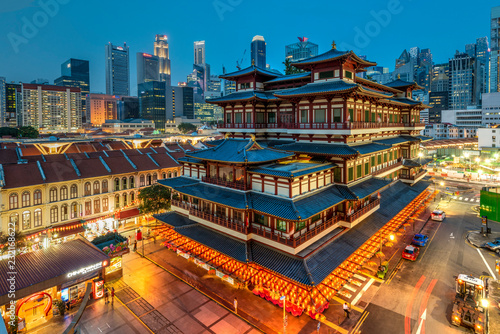 Buddha Tooth Relic Temple and city skyline, Singapore photo