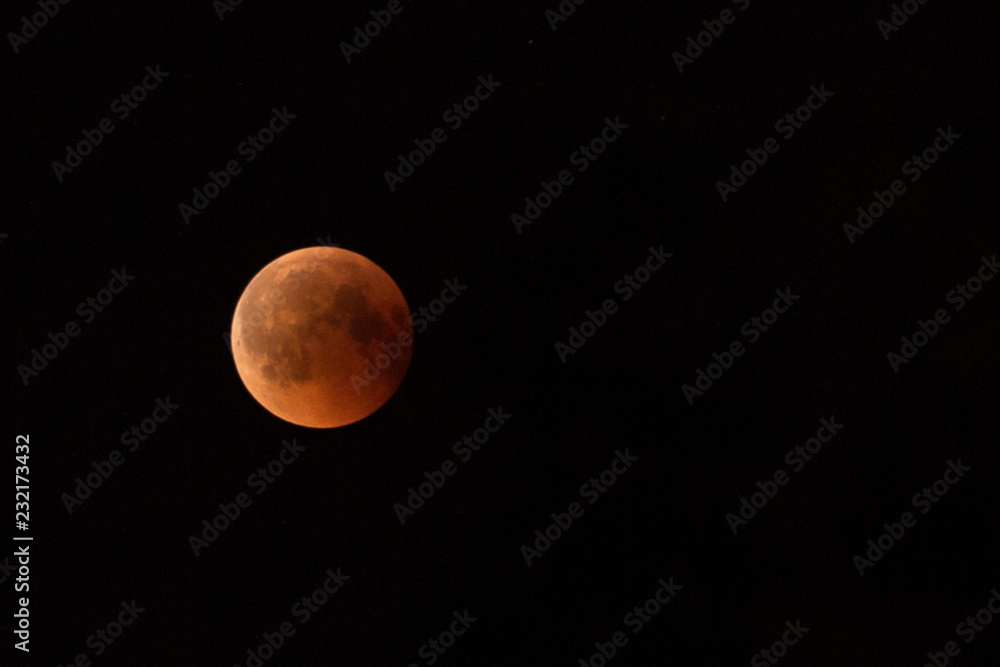 July 27, 2018 is the longest lunar eclipse of the century. Lunar eclipse in the black night sky July 27, 2018 is the longest lunar eclipse of the century. Lunar eclipse in the black night sky