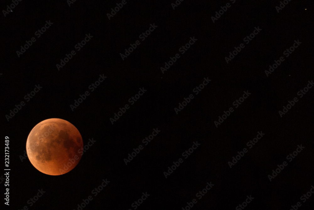 July 27, 2018 is the longest lunar eclipse of the century. Lunar eclipse in the black night sky July 27, 2018 is the longest lunar eclipse of the century. Lunar eclipse in the black night sky