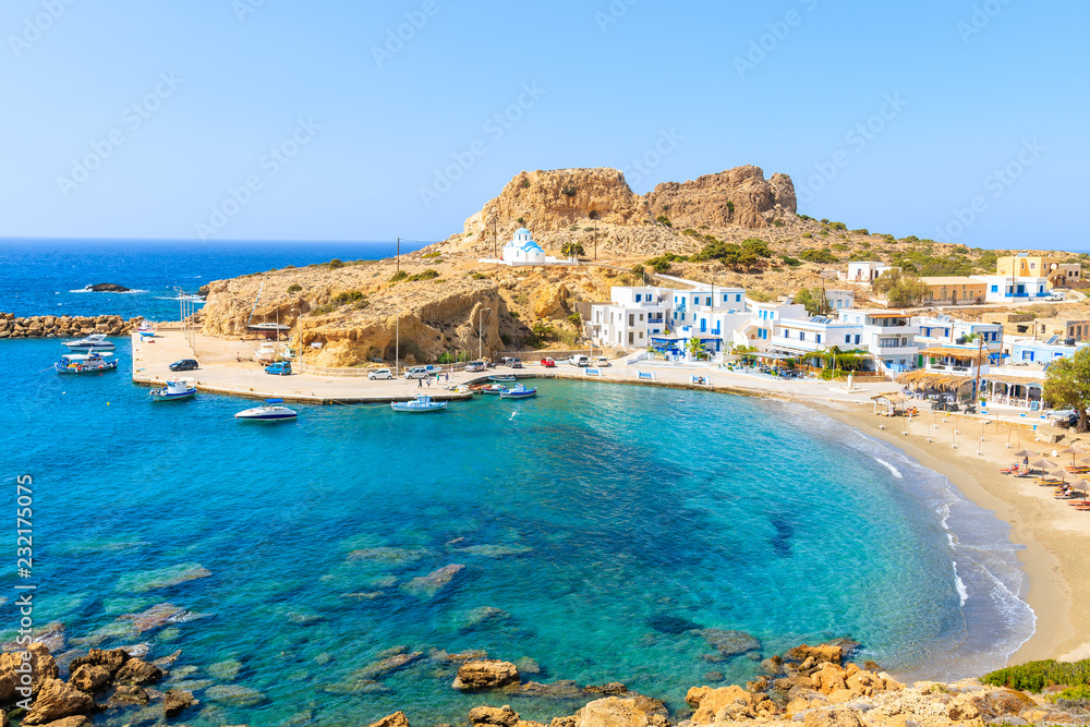 Beautiful sea bay with in Finiki village on coast of Karpathos island, Greece