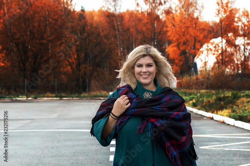 fat beautiful girl outside in autumn