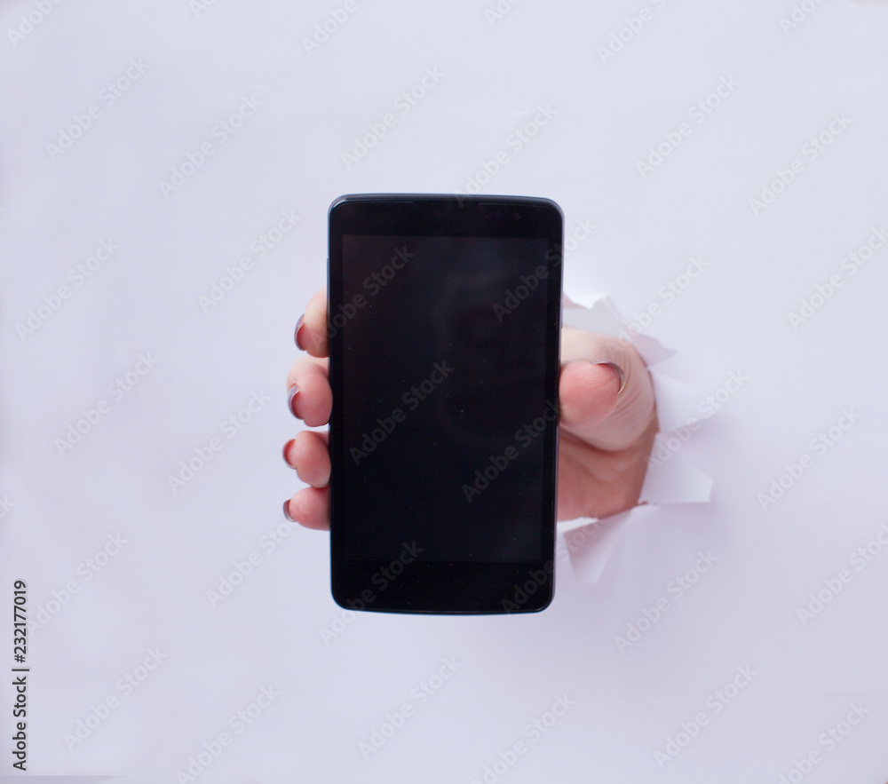 hand holding black phone isolated on white background