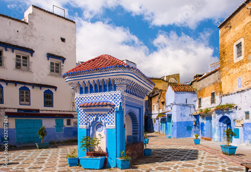 Public fountain of the Plaza El Hauta, square in medina of Chefchaouen Morocco © Kotangens