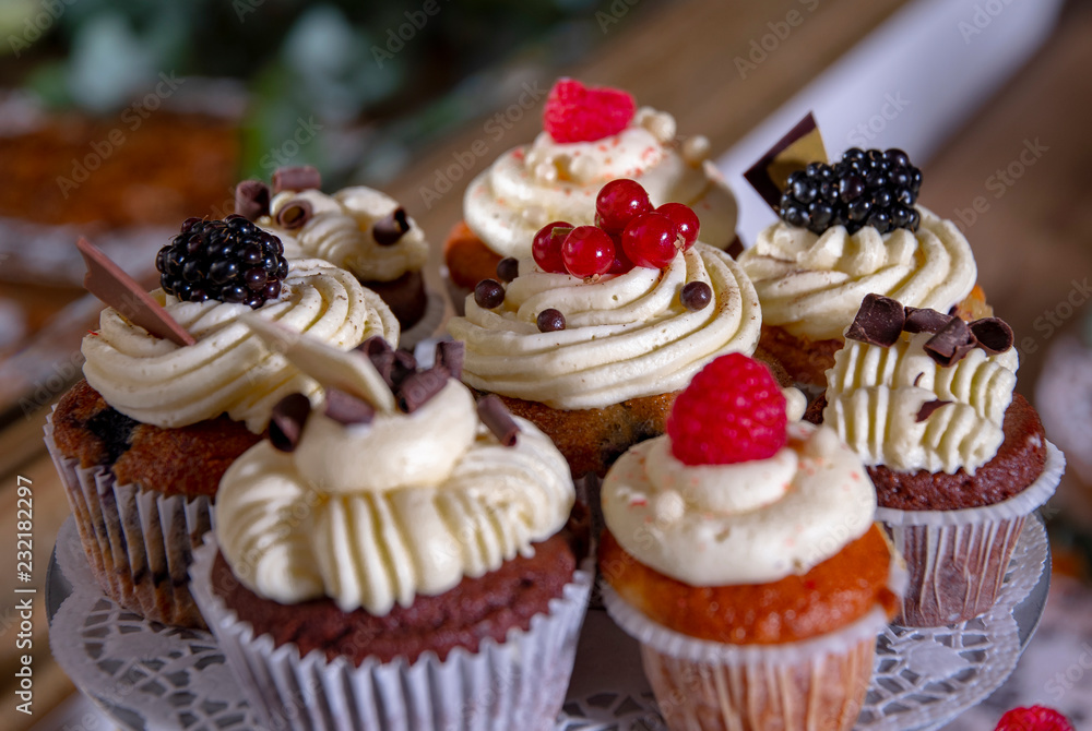 cupcakes with fruits at sweet table buffet