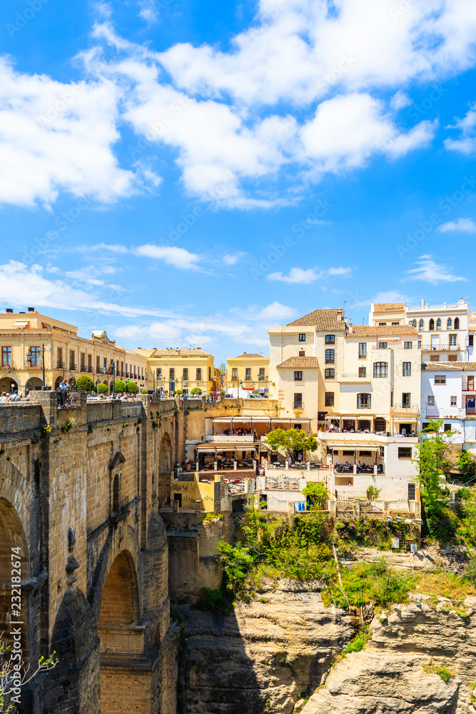 Famous bridge and white houses in Ronda village in spring, Andalusia, Spain