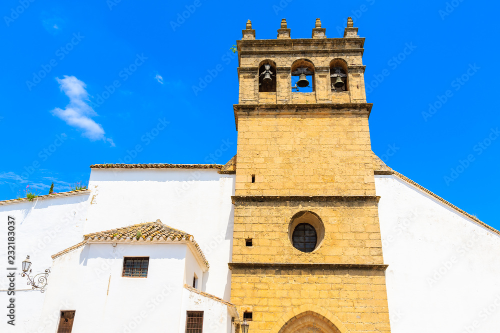Church facade in Ronda village in spring, Andalusia, Spain