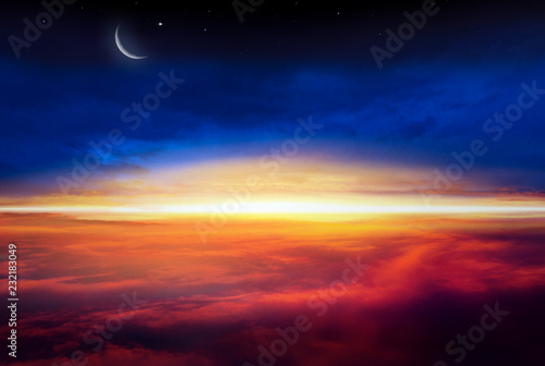  Crescent moon with beautiful sunset background . Generous Ramadan . Light from sky . Religion background .
