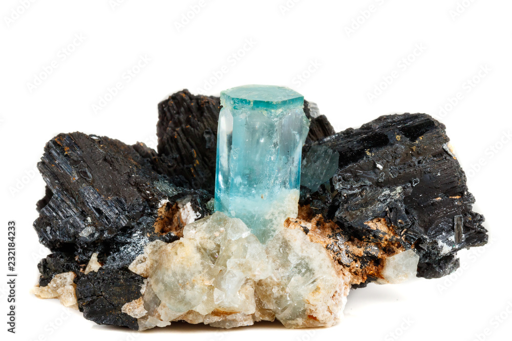 Macro mineral stone Aquamarine and black tourmaline, Schorl on a white background Macro mineral stone Aquamarine and black tourmaline, Schorl on a white background
