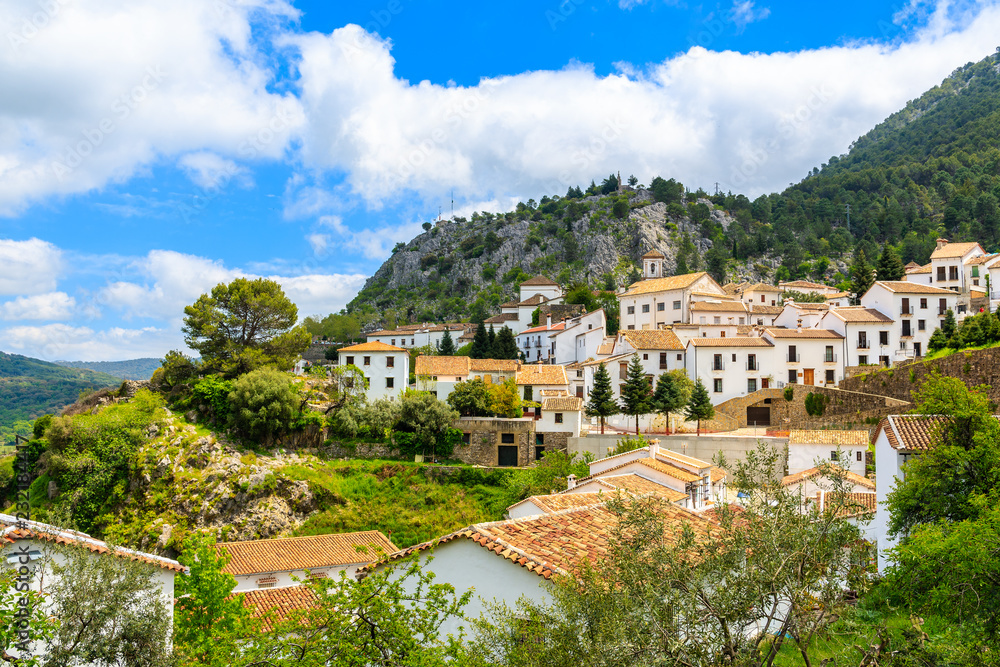 White village of Grazalema in green mountain landscape of Andalusia, Spain