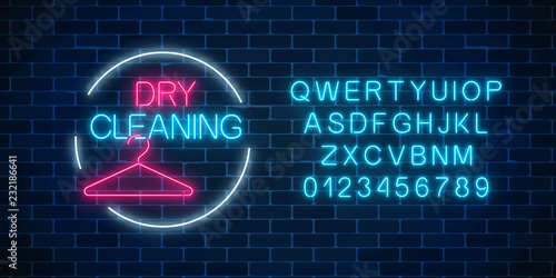 Neon dry cleaning glowing sign with hanger in circle frame with alphabet. Cleaning service signboard design.