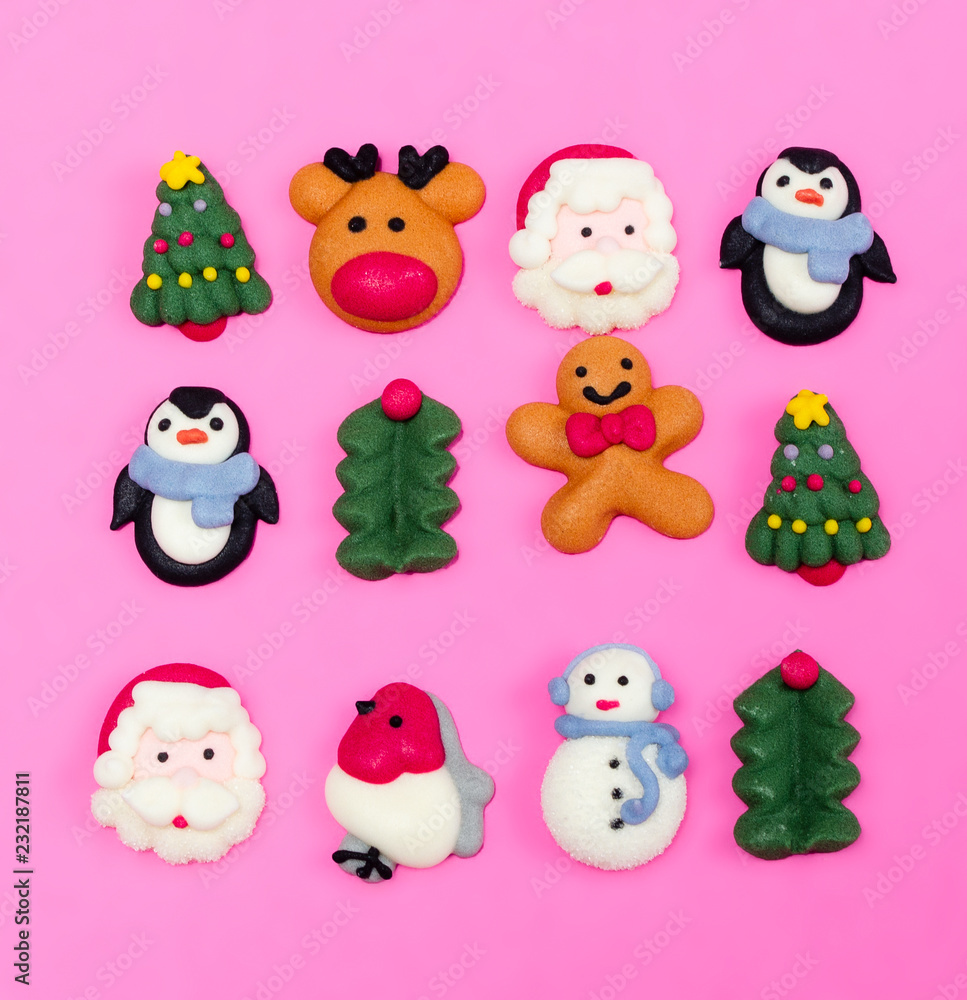 Christmas food decorations. Christmas symbols. Christmas cookies on pink background from above. desert. Christmas food decorations. Christmas symbols. Christmas cookies on pink background from above. desert.
