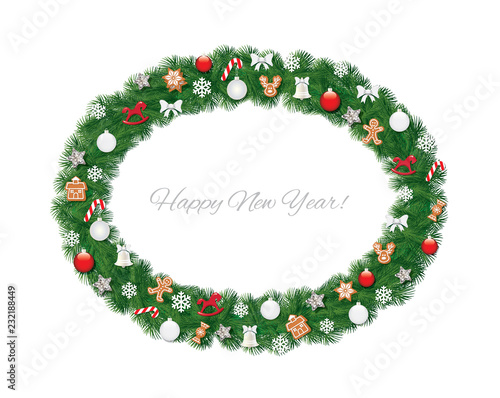Christmas wreath oval frame decorated with gingerbread cookies, balls and snowflakes.
