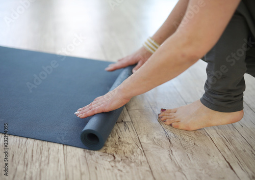 Yoga mat rolling up
