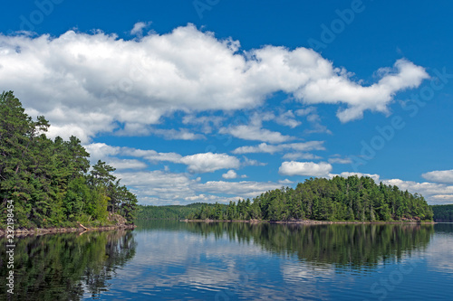 Puffy Clouds in Summer on a North Woods Lake