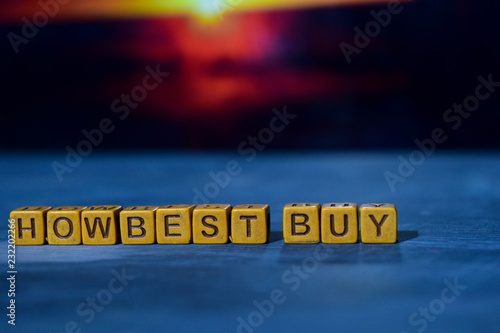 How best buy on wooden blocks. Cross processed image with bokeh background