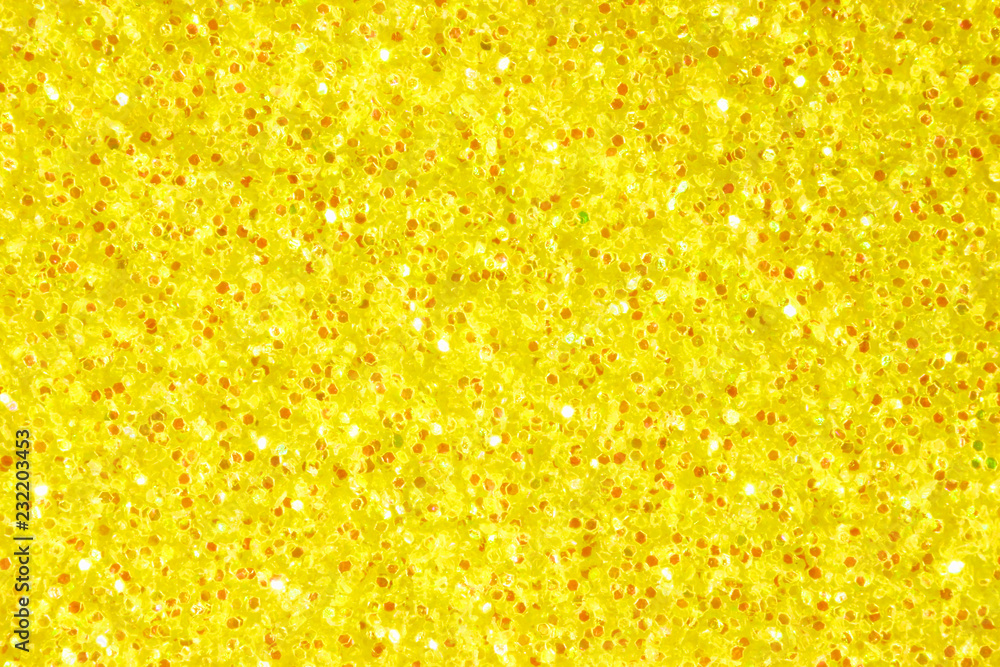 Glitter dust yellow decorative close up Glitter dust yellow decorative close up