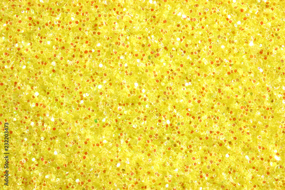 Glitter dust yellow decorative close up Glitter dust yellow decorative close up