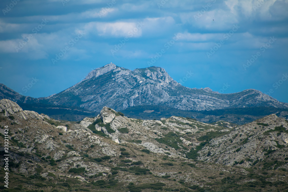 A view of the beautiful Alpilles countryside as seen from the Medieval ruins of the fortress of Les-Baux-De-Provence in France A view of the beautiful Alpilles countryside as seen from the Medieval ruins of the fortress of Les-Baux-De-Provence in France