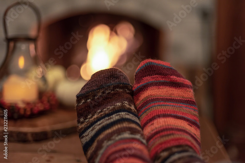 Relaxing by the fire in handknit socks