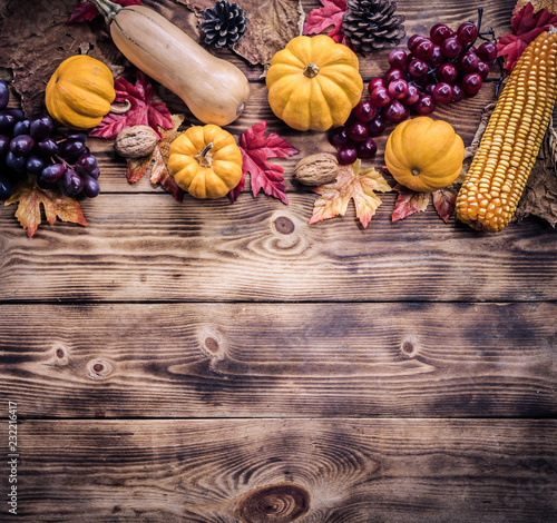 Thanksgiving background with fruit and vegetable on wood in autumn and Fall harvest season.Copy space for text. photo