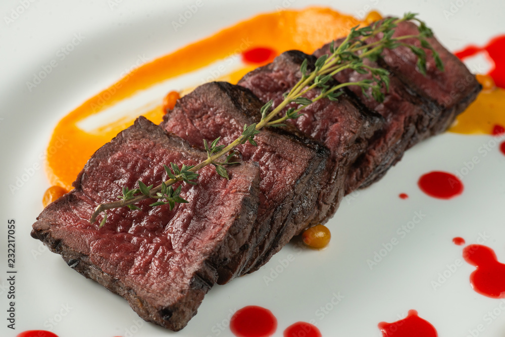 Beef roast on white plate Beef roast on white plate