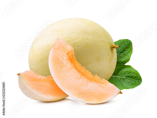 whole and slices honeydew cantalupe melon(sunlady) with green leaf isolated on white background